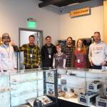 The staff of Uncle Herb&rsquo;s, Homer&rsquo;s first marijuana retail store, get ready for their opening day Thursday, May 24, 2018 on Ocean Drive in Homer, Alaska. (Photo by Megan Pacer/Homer News)