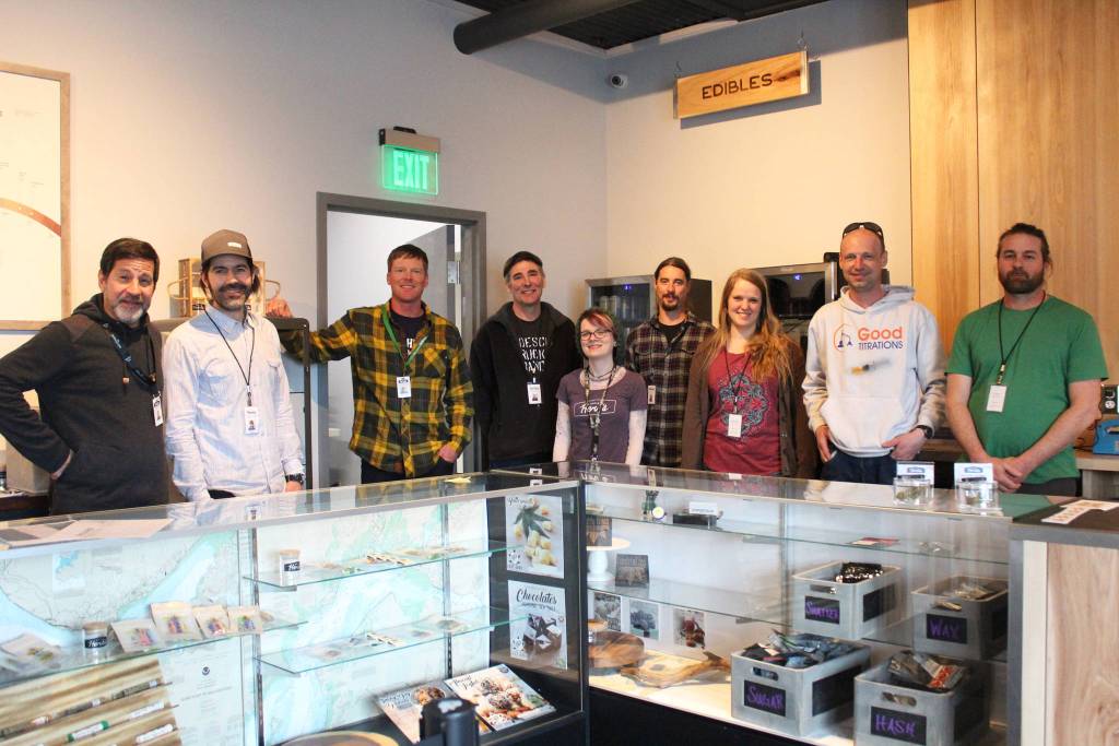 The staff of Uncle Herb&rsquo;s, Homer&rsquo;s first marijuana retail store, get ready for their opening day Thursday, May 24, 2018 on Ocean Drive in Homer, Alaska. (Photo by Megan Pacer/Homer News)