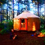 Photo by Jennifer Tarnacki A campfire is made as the sun sets in August 2017 at Tutka Yurt 2 across Kachemak Bay from Homer.