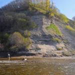 An angler tosses a line in the water near the mouth of Deep Creek on May 28 in Ninilchik. (Photo by Elizabeth Earl/Peninsula Clarion)