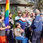Homer Mayor Bryan Zak greets people after reading a Mayoral Recognition recognizing June as Homer Pride Month at about 6 p.m. Monday, June 11, 2018 outside Homer City Hall in Homer, Alaska. A crowd of about 75 people attended in support of Pride Month. Council members Shelly Erickson, Heath Smith and Thomas Stroozas notified the city clerk that they would not attend the June 11 meeting, forcing its cancellation because of lack of a quorum. (Photo by Michael Armstrong/Homer News)