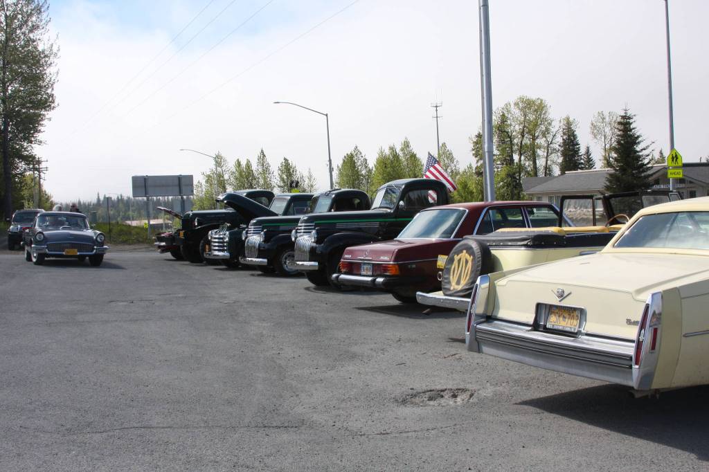 A line of classic cars from local owners and Kaknu Kruzers is displayed at Thurmond&rsquo;s Far West Auto during their fourth annual Customer Appreciation Day on Saturday, June 9 in Anchor Point, Alaska. (Photo by Delcenia Cosman)