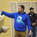 Homer Community Recreation Program Director Mike Illg describes the uses and capacities of the gymnasium inside one of the two Homer Education and Recreation Complex buildings during a walk-through Tuesday, June 26, 2018 in Homer, Alaska. Illg is also a member of the Parks, Art, Culture and Recreation Advisory Commission. The citys HERC Task Force inspected the building along with members of the public while city staff answered questions about the two buildings history and current state. (Photo by Megan Pacer/Homer News)