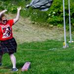 Brandi Neuterman tosses the halibut at the Kachemak Bay Scottish Club Highland Games on Saturday, July 7, 2018, at Karen Hornaday Park in Homer, Alaska. (Photo by Michael Armstrong/Homer News)