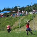 Sherri Borchert of Anchorage launches a caber into the air during the womens caber toss at this years Kachemak Bay Highland Games on Saturday, July 7, 2018 at Karen Hornaday Park in Homer, Alaska. (Photo by Megan Pacer/Homer News)