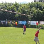 A novice competitor practices throwing a caber while Kachemak Bay Scottish Club President Robert Archibald looks on Saturday, July 7, 2018 at this years Kachemak Bay Scottish Highland Games at Karen Hornaday Park in Homer, Alaska. (Photo by Megan Pacer/Homer News)