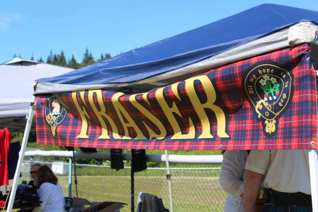 A clan booth advertises the Fraser clan at this years Kachemak Bay Scottish Highland Games on Saturday, July 7, 2018 at Karen Hornaday Park in Homer, Alaska. (Photo by Megan Pacer/Homer News)