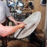 Artist Jeff Dean explains the process behind one of his metal work art pieces for a client to Leah Evans Cloud during a tour of the Dean family farm and art studios Friday, July 6, 2018 off East End Road near Homer, Alaska. (Photo by Megan Pacer/Homer News)