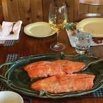 Fresh salmon hot off the grill is the centerpiece of an Alaska summer meal. (Photo by Teri Robl)