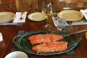 Fresh salmon hot off the grill is the centerpiece of an Alaska summer meal. (Photo by Teri Robl)