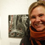 Annie Bailey stands by her painting, “Initial Assessment,” inspired by her emergency medical training class. -Photo by Michael Armstrong, Homer News