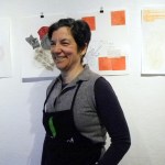 Elizabeth Emery stands by some of her prints.-Photo by Michael Armstrong, Homer News