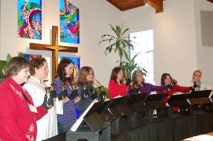 The Jubilation! Bells choir practices after services on Sunday at Homer United Methodist Church. From left to right are Joan Evans, Pastor Lisa Talbott, Katie Bynagle, Susan Clardy, Mary Fell, Lucy Kunkler, Karen Sonnen and Jessica Sonnen. The Jubilation! Bells choir will perform tonight, Dec. 24, beginning at 6:30 p.m. at the Homer United Methodist Church. The Christmas Eve service officially begins at 7 p.m.