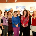 Some of the students in Asia Freeman’s Kachemak Bay Campus painting and drawing class pose with her at a reception on Nov. 20 at the college. From left to right are Shirley Coursey, Shannon Cefalu, Melody Barrett, Stan White, Rita Pfeninger, Nell Gustafson, Freeman, Karen Holbrook, Debbie Poore, Carol Beverly and Chris Beverly. Not shown is Oceana Wills. Coursey, White and Holbrook are in Freeman’s drawing class, but did not have work in the show.-Photo by Michael Armstrong, Homer News