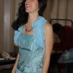 Models try on some of the pieces that will be featured in Saturday’s Wearable Arts show. Decker models a masquerade jacket created by Risa Jackinsky.-Photo by McKibben Jackinsky, Homer News