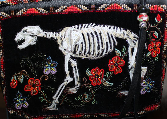 Kate Boyan’s beading artistry covers the front of this bag.