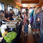 A variety of food and drink to please young and old palates is served and sampled Saturday during the second annual Taste of Homer. The event was again held at Wasabi’s.-Photo by Jim Lavrakas, Far North Photography