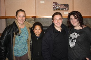 First-place BIZ-Idea winner David Harris, second from right, is pictured with his family Nov. 20 during the announcement of the winners. From left are his mother Carrie Harris, brother Sam Harris, Harris and girlfriend Bethanni Quinn.-Photo by Lindsay Olsen
