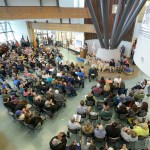 A standing-room-only crowd applauds June 12 as Kenaitze Indian Tribe Executive Director Jaylene Peterson-Nyren makes opening remarks during the first day of a three-day grand opening ceremony for the Dena’ina Wellness Center located in Old Town Kenai.-Photo by M. Scott Moon, Kenaitze Indian Tribe