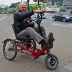 At right, Bob Janes shows the tight turning radius of his new electric-assisted tricycle in downtown Juneau recently.-Photo by Michael Penn, Morris News Service - Alaska
