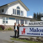 The Homer team from Malone Insurance Agency gather beside the company’s recently purchased building on Pioneer Avenue. From left to right are Melissa Pellegrom, Lisa Rich and Carol Whitaker. The agency is owned by Randy and Nancy Boeshart.-Photo by Shannon Reid