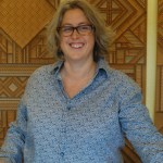 Sustainable Wares owner Karen West stands behind a refurbished glass display case that once had been used at the Fresh Sourdough Express Bakery.-Photo by Michael Armstrong, Homer News