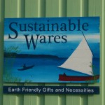 The Sustainable Wares sign is made from recycled wood and painted by Tracy Early and Tracy Hansen of Lost Things Design.-Photo by Michael Armstrong, Homer News