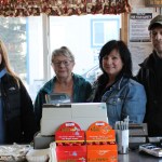 Members of the Thurmond family celebrate the grand opening of Thurmond’s Far West Auto on Monday. From left: Brandi Blauvelt, her grandmother and Thurmond’s original owner Vanita Thurmond, and new owners Elaine and Dale Griner.-Photo by McKibben Jackinsky, Homer News