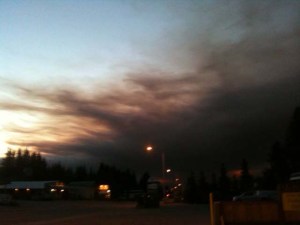 Early Tuesday morning, smoke from a fire on Funny River Road, east of Soldotna, was making its way south to the Homer area.-Photo by McKibben Jackinsky