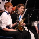 Zak Holschen on bass clarinet and Carly McLean on tenor sax perform with the school’s swing band, directed by Amy Johnson.-Photo by McKibben Jackinsky, Homer News