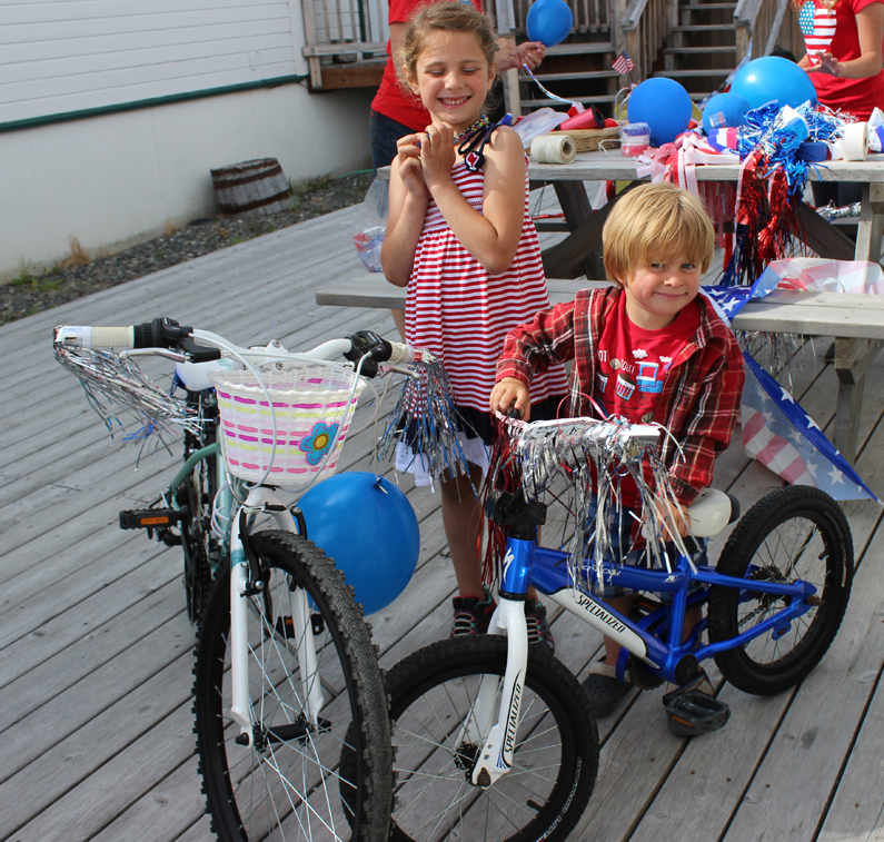 Mako Haggerty, who represents the southern peninsula on the Kenai Peninsula Borough Assembly, dresses for the occasion in the Homer parade.-Photo by McKibben Jackinsky, Homer News