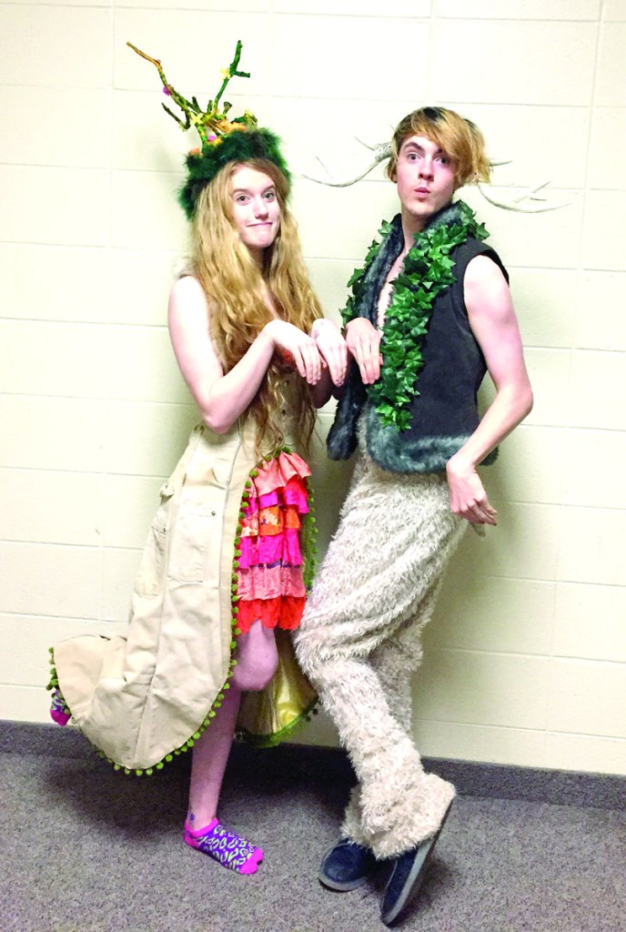 Jessie Hiller and Johnny Hamilton model deer costumes by local artists