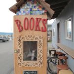 Take a book or leave a book at the micro-library outside La Baleine Cafe.-Photo by Miranda Weiss