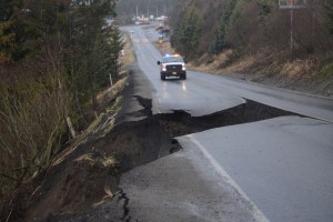 Wet soils caused a section of Kachemak Drive to collapse on Sunday morning. The road is closed about a half mile from the Homer Spit Road to the top of the hill near the old airport. Kachemak Drive remains open from the East End Road intersection to the old airport.-Photo by Michael Armstrong, Homer News