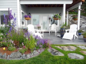 Joan Splinter’s and Don Felton’s garden creates an oasis of calm and color. It was one of the gardens featured in the 2014 garden tour. Five gardens are on this year’s tour; all are designed to inspire — just like this one.-Photo by Brenda AdamsBrenda Adams