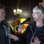 Emcee Dax Radke interviews former Homer Winter Carnival Queen Shelly Ericksen.-Photo by McKibben Jackinsky, Homer News