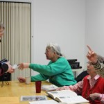 Laura Lofgren Barton, center, Lorene Tepa Hansen Rogers, second from right, and Daisy Lee Bitter, right, share stories about Homer’s early days at “Meet the People,” an April 3 presentation co-sponsored by the Pioneers of Alaska and the Center for Alaskan Coastal Studies.-Photo by McKibben Jackinsky, Homer News