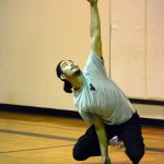 David Thomas of Point Hope demonstrates the one-hand reach during a presentation on Native Youth Olympics last Thursday at Homer Middle School. -Photos by Michael Armstrong