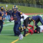 Josh Fisk, 32, gives the Mariners a two-point conversion in the first quarter of Saturday’s game against the Houston Hawks.-Photo by McKibben Jackinsky, Homer News