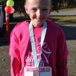 A smiling Marina Martushev of Kachemak Selo as the first-place finisher.-Photo by McKibben Jackinsky, Homer News