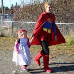 Joy Ridgley and her mom, Annie, let their super-hero selves shine through in Saturday’s Girls On the Run 5k-Photo by McKibben Jackinsky, Homer News
