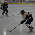 Homer’s JJ Sonnen moves the puck during the Mariners’ Nov. 11 game against the SoHi Stars.