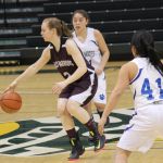 Nikolaevsk senior Kilina Klaich stays a step ahead of the Newhalen Malamutes at the 1A State basketball tournament game for fourth place.-Photo by McKibben Jackinsky, Homer News