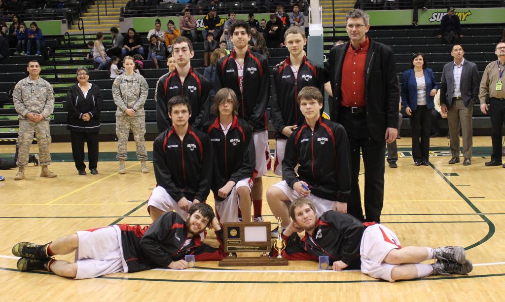 The Seldovia Sea Otter team poses with the first-place 1A trophy. Front row from left: Chance Haller and Seth O'Leary; middle row: Dylan Waterbury, Sam Scribner and Sage Stanish; back row: Calem Collier, Sami Ozyildirim, Aidan Philpot. -Photo by McKibben Jackinsky, Homer News