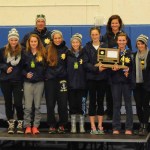 Mariners’ state championship cross-country team: Ziza Shemet Pitcher, Alex Mosley, Aurora Waclawski, Lauren Evarts, Megan Pitzman, Haley Knott, Molly Mitchell with Head Coach Bill Steyer and Assistant Coach Saundra Choate-Hudson.-Photo by Stephanie Pitzman