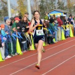 Mariner Megan Pitzman makes the final push to the finish line of the state championship cross-country meet in Anchorage Oct. 4. -Photo by Stephanie Pitzman