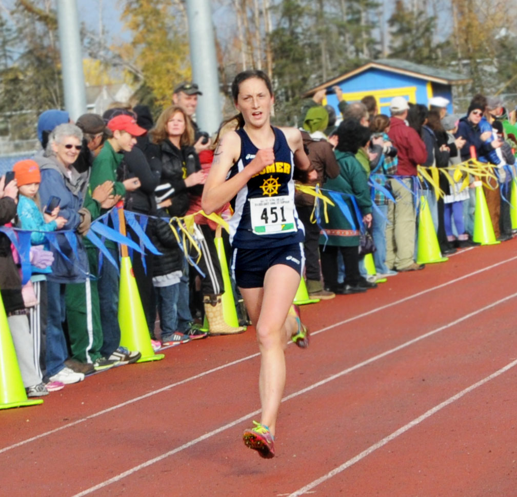 Mariner Megan Pitzman makes the final push to the finish line of the state championship cross-country meet in Anchorage Oct. 4. -Photo by Stephanie Pitzman