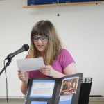 Sara Bacus reads a riddle.