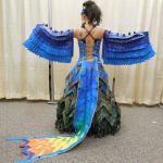 A Juneau artist models her tarpaulin bird costume