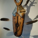 Drew Michael discusses his work, “Reaching Out,” at the First Friday opening of his show, “Spaces Within,” at Bunnell Street Arts Center.-Photo by Michael Armstrong, Homer News